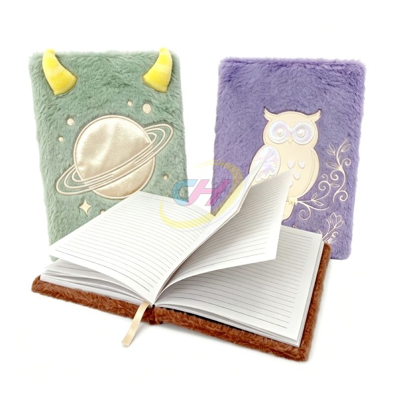 Open ruled plush notebook with ribbon bookmark and decorative covers