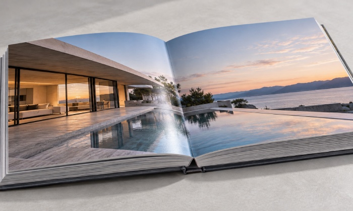 Mounted lay-flat photo book showing thick pages and minimal image loss at the centre